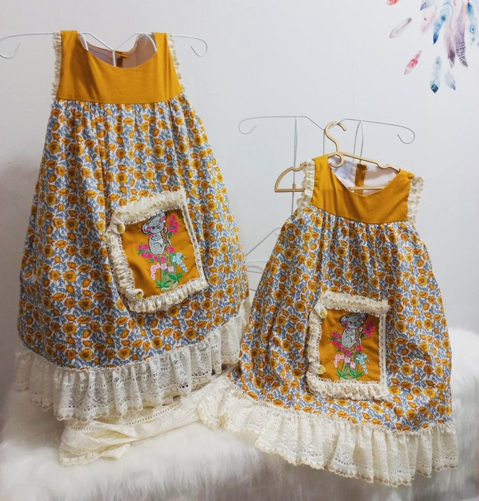 100% Cotton Floral Dress With Built-In Storybook Atop Middle Pocket - Image 2