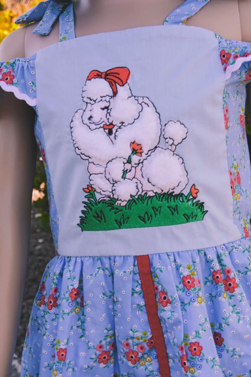 Blue Cotton Blend · Red Floral Accents · Whimsical & Refined1