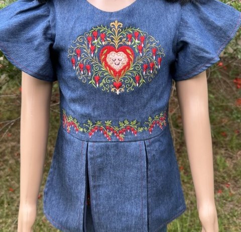 HEARTBRAIN COLLECTION, LONG SHIRT, FRONT DETAIL, CROPPED The HeartBrain long denim shirt with embroidered heart medallion, bleeding heart waistband, and pleated flare, Only For Princesses.