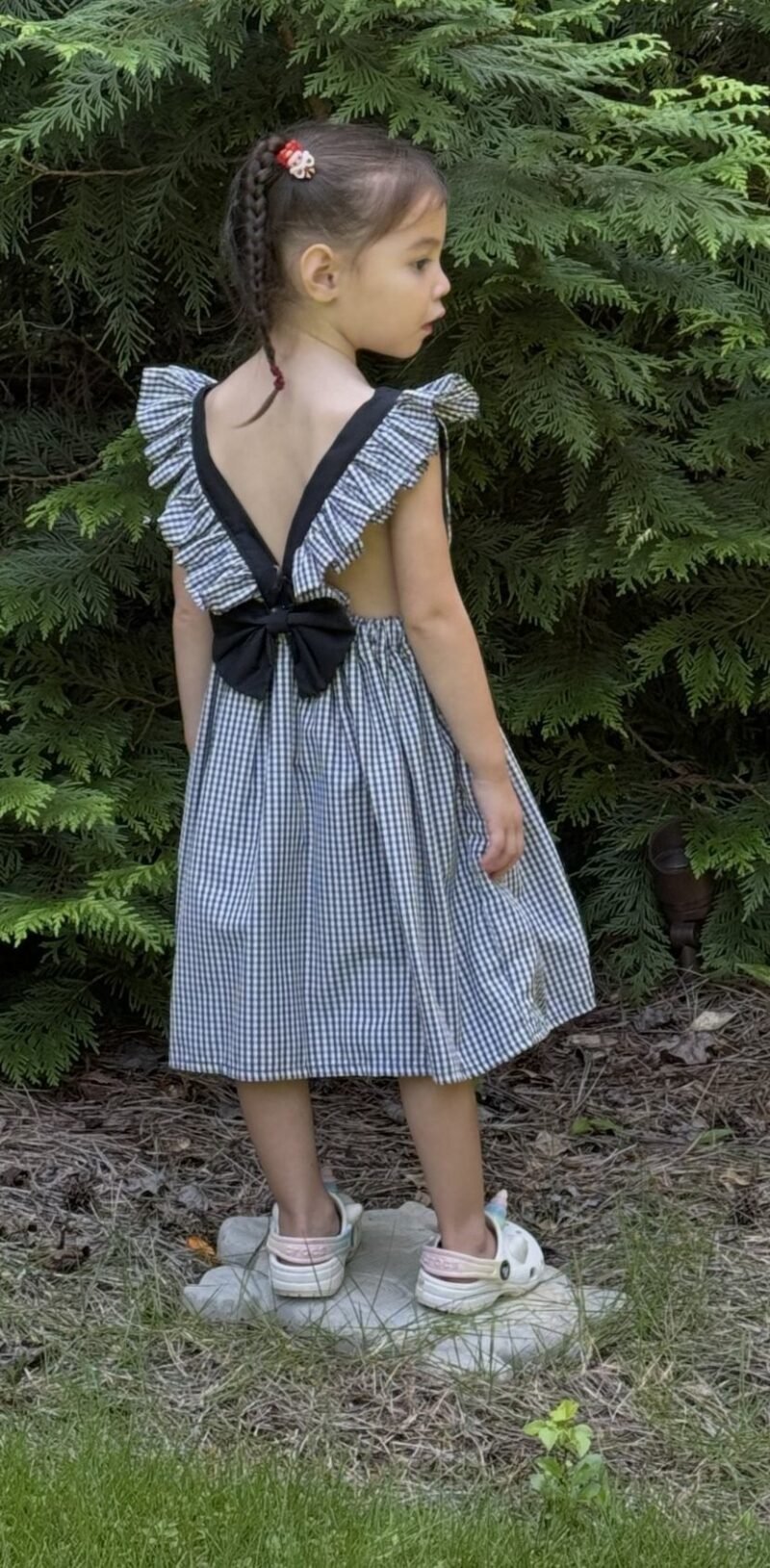Dolly’s Summer Garden Dress, back with bow, modeled by Lola