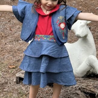 HeartBrain Three-Piece Denim Set with bolero jacket and tiered skirt, modeled by Lola