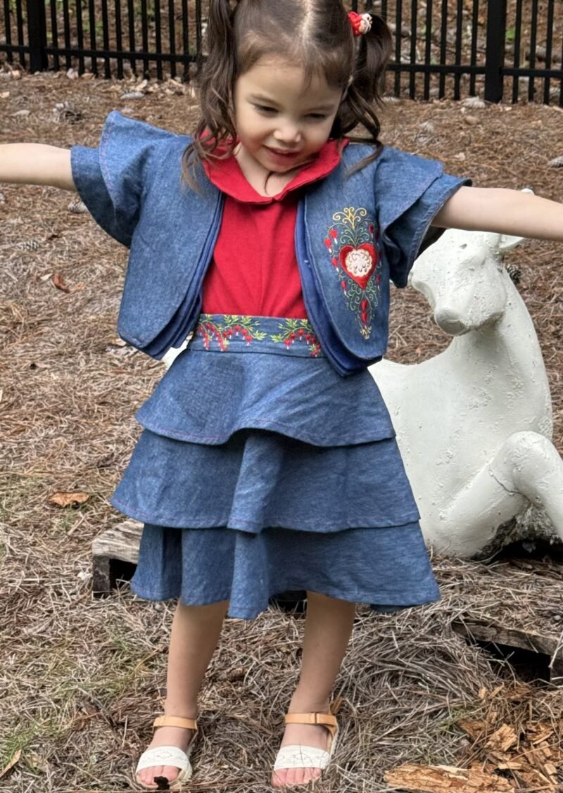 HeartBrain Three-Piece Denim Set with bolero jacket and tiered skirt, modeled by Lola