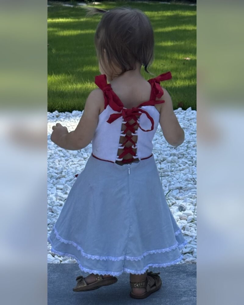 Madam Loretta VanMil Dress, back view, modeled by Nova