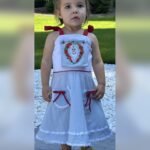 Madam Loretta VanMil Dress, front view, modeled by Nova