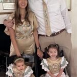 The Royal Family Collection: mother in the jumpsuit, father in the tie, the girls in their dresses